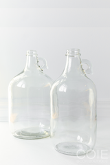 A comparison image of our Glass Jug Vase - Medium and Large